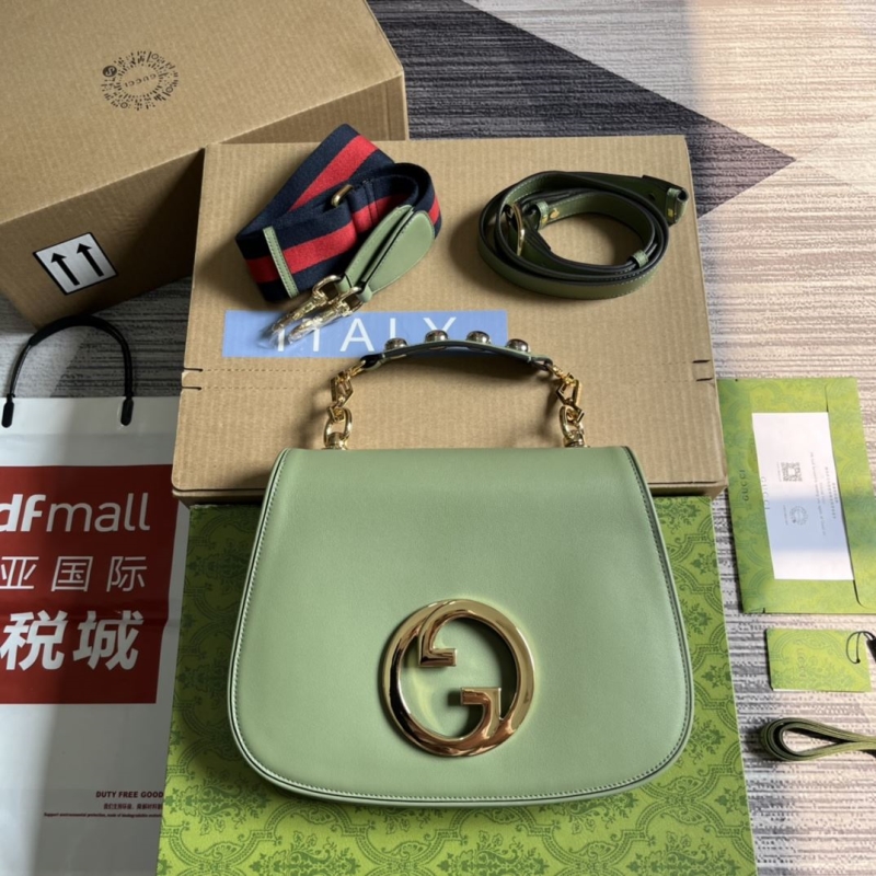 G*u*i top handle bags